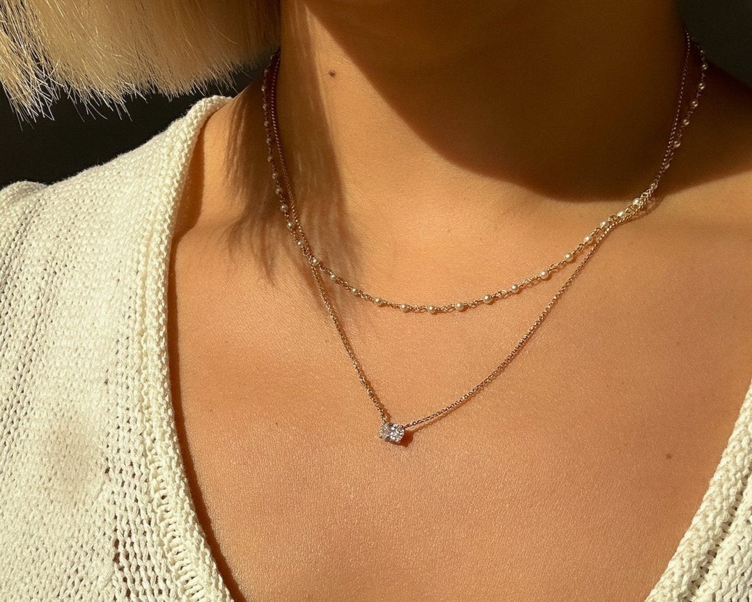 Golden Hour Necklace Stack of Mini Pearl Necklace and Oval Solitaire Necklace